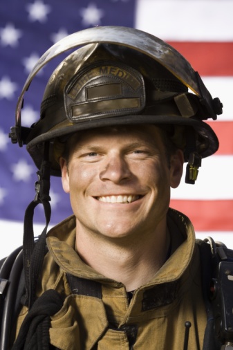 Firefighter Smiling and Flag